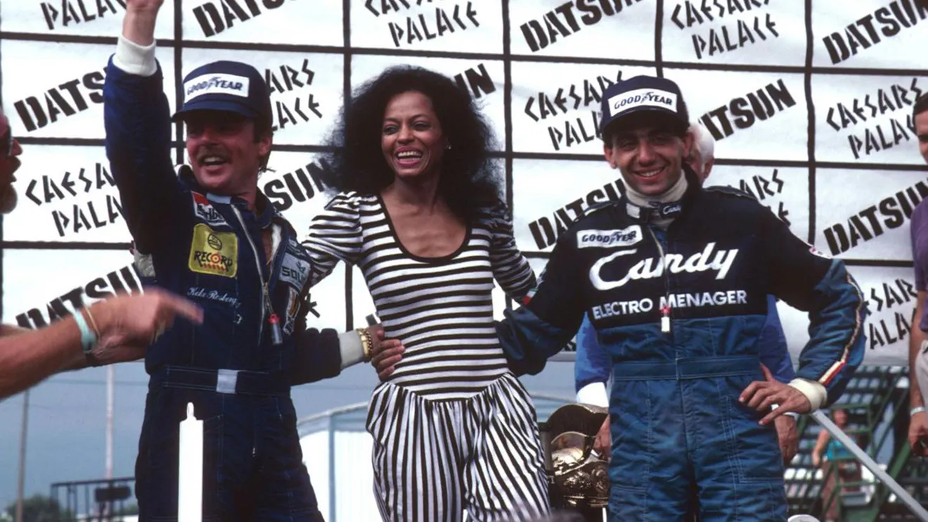 Keke Rosberg, la cantante Diana Ross y Michele Alboreto en el podio de 1982